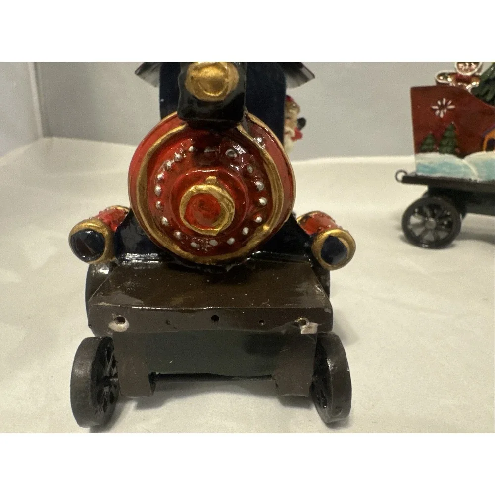 Sterling 3 Piece Resin  Santa,‎ Snowman and Tree Christmas Train Set.
